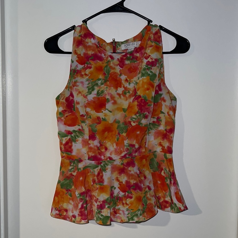 Sleeveless blouse. Floral. US size XS